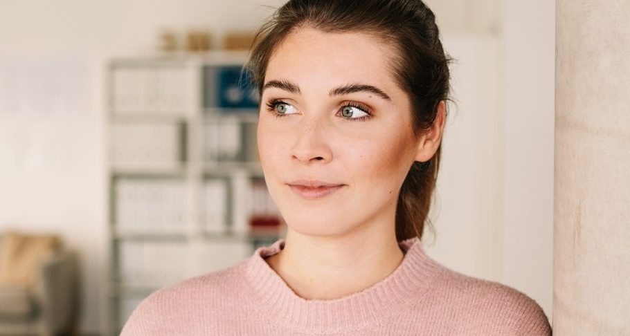 young confident woman looking off to the side